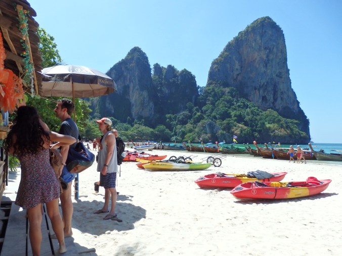 Danny standing in line waiting to or a fresh fruit smoothie!