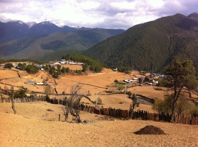 village...surrounded by 15-18,000 ft. mountains.