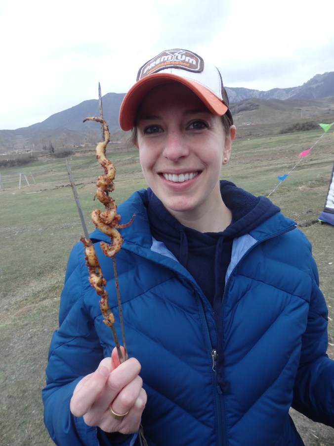 Kristen and her squid shish-kebob. 